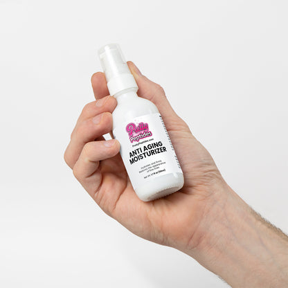 Applying Prettypeptides Anti-Aging Moisturizer to face and neck for hydration and wrinkle reduction